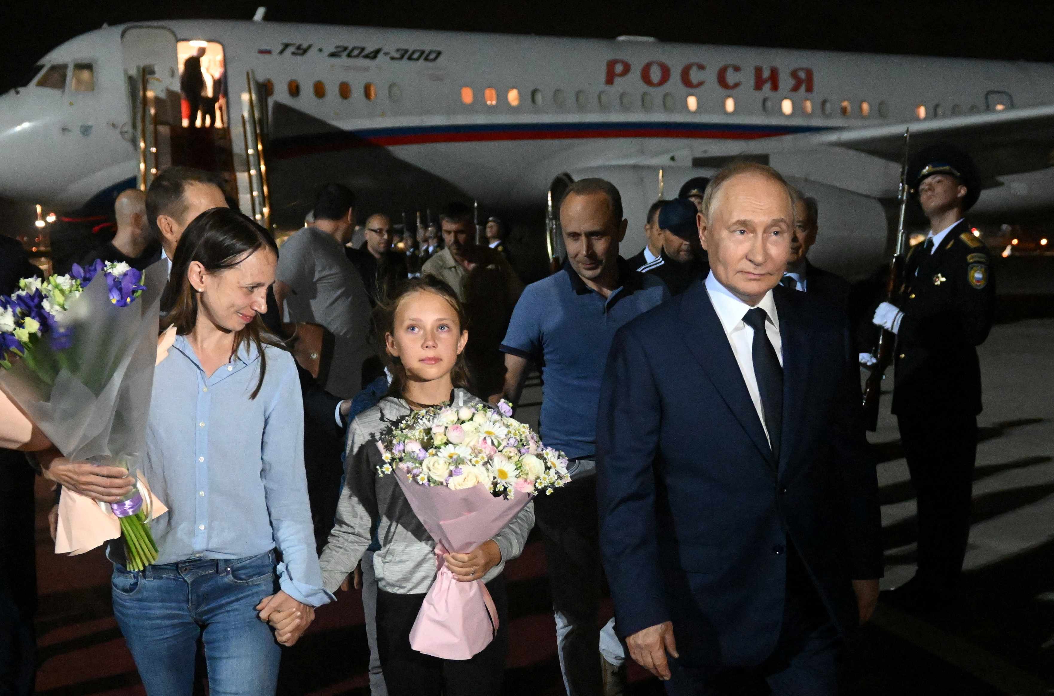 Vladimir Putin recibiendo a los Dultsev en Moscú (Reuters)